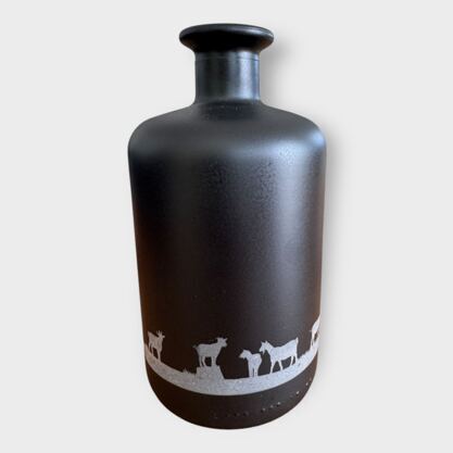 Glasflasche mit Lampe Silhouette Ziegen
