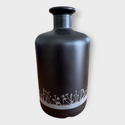 Glasflasche mit Lampe Silhouette Blumenwiese