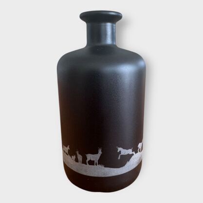 Glasflasche mit Lampe Silhouette Gams